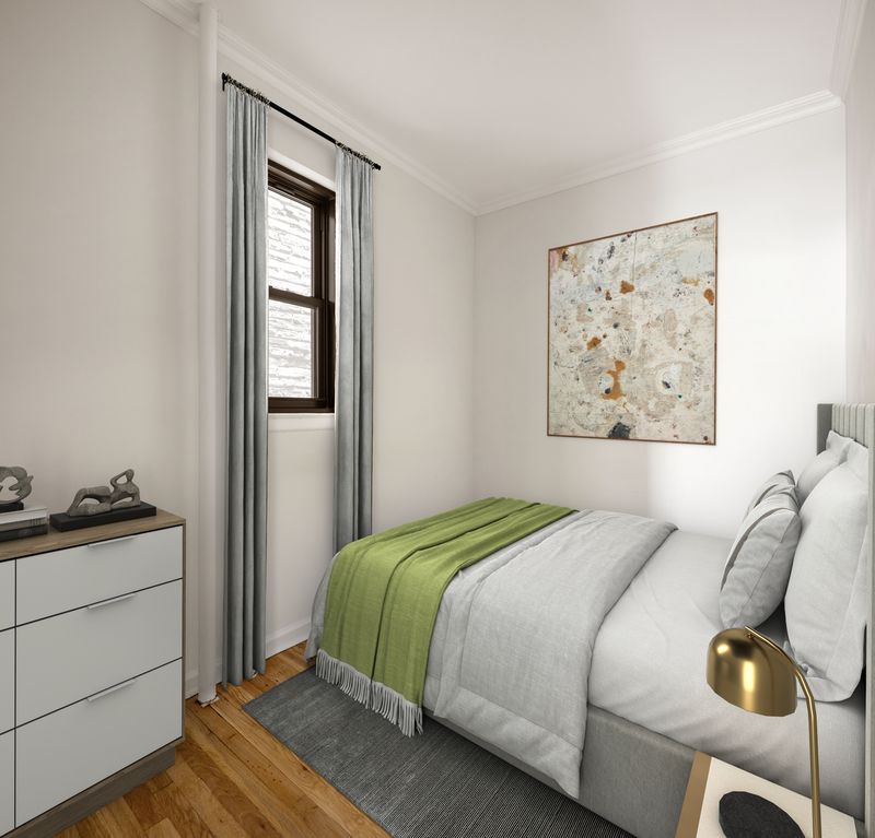 431 West 54th Street, Unit 3C Manhattan, NY 10019 - Photo 2 of 5 a bedroom with a bed and a window