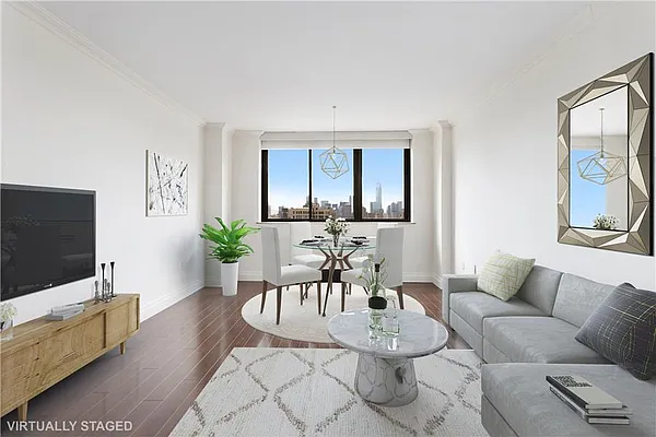 280 Park Avenue South, Unit 24E Manhattan, NY 10010 - Photo 1 of 6 a living room with furniture and a flat screen tv