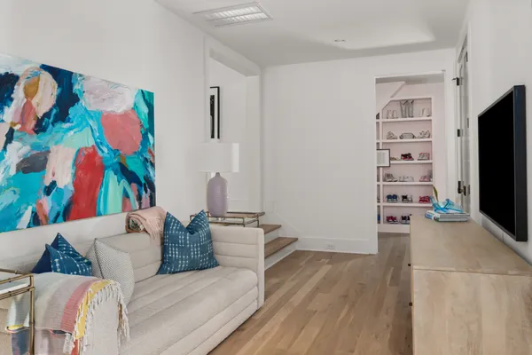 a bathroom with a granite countertop sink a toilet and shower