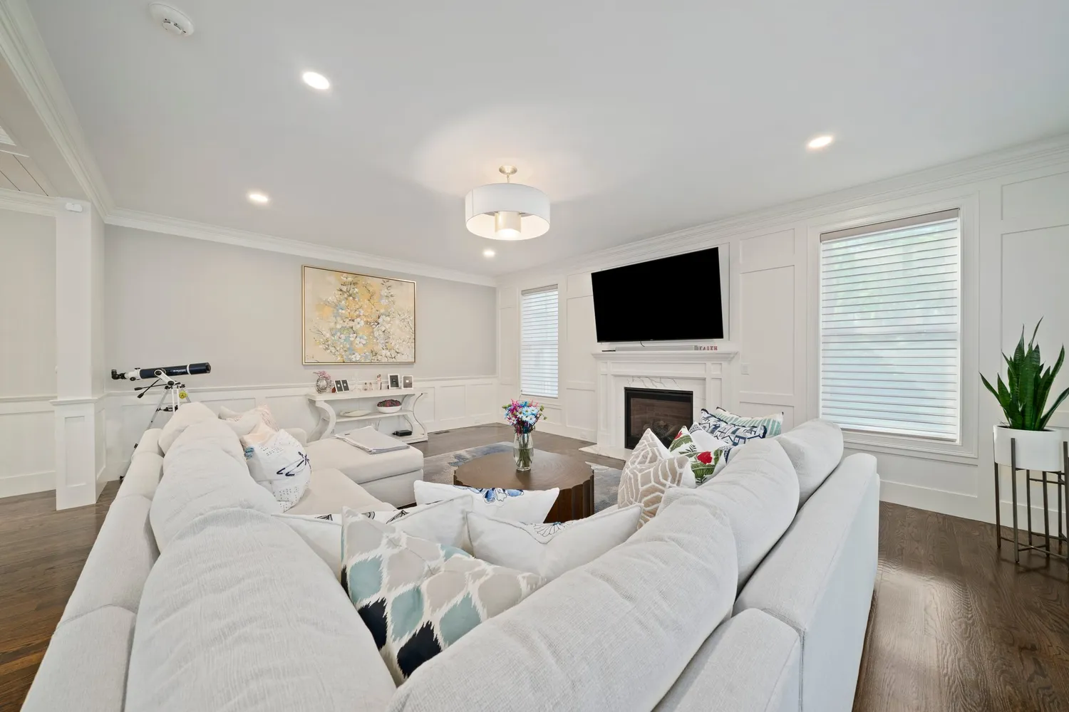 a bathroom with double vanity sink a mirror and a bathtub