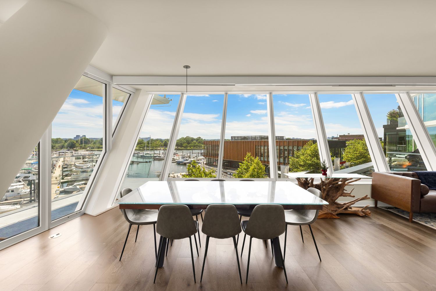 a kitchen with stainless steel appliances granite countertop a sink and a refrigerator