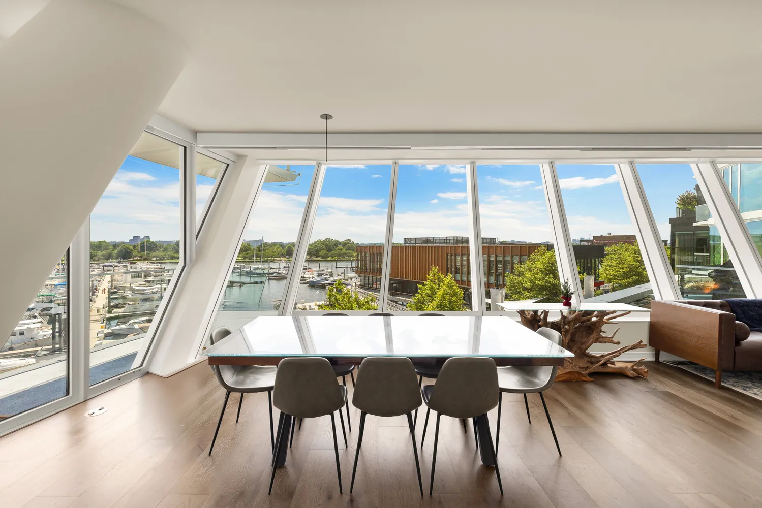 a kitchen with stainless steel appliances granite countertop a sink and a refrigerator