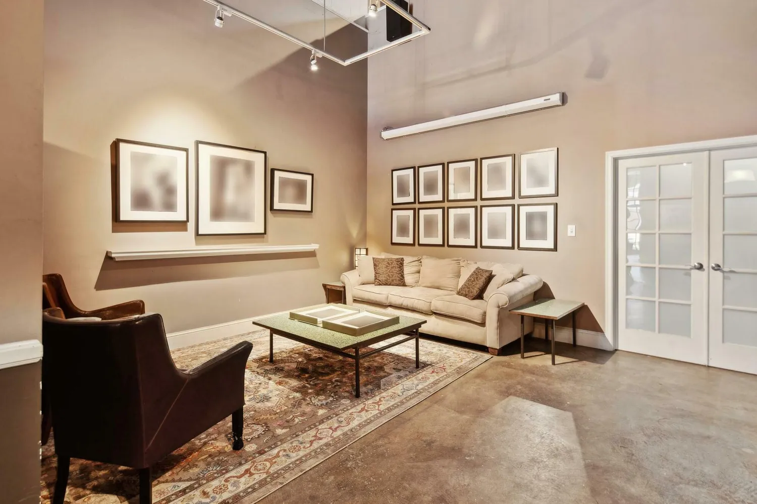 a view of a livingroom with furniture and a couch