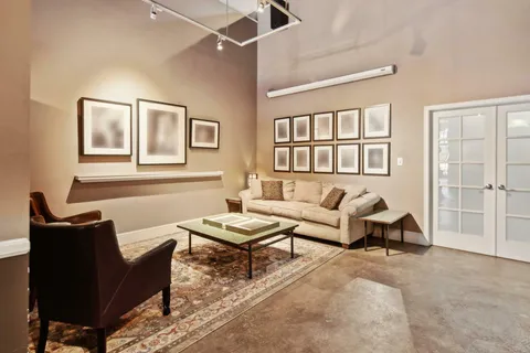 a view of a livingroom with furniture and a couch