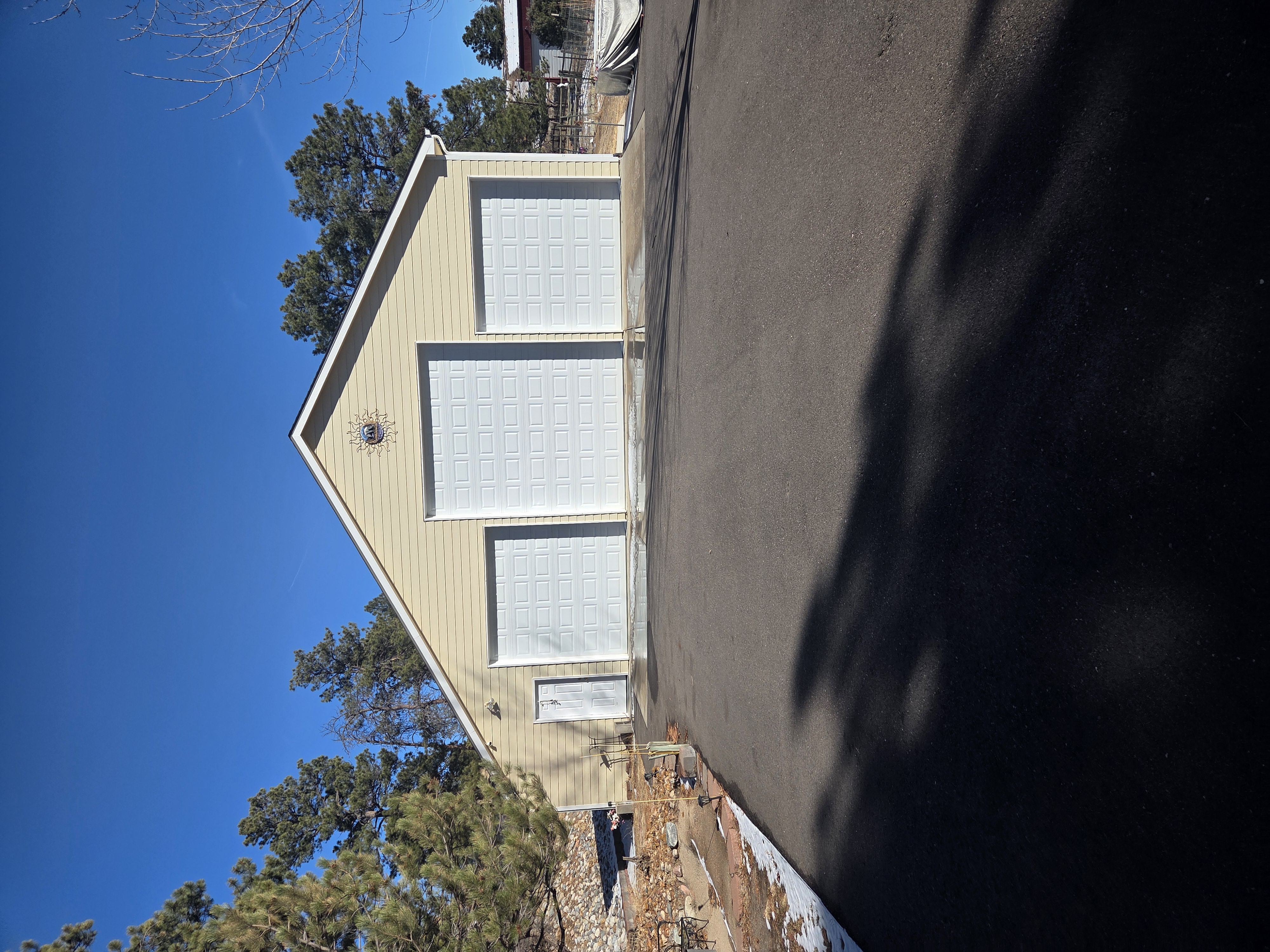 7550 North Village Road Parker, CO 80134 - Photo 3 of 13 a front view of a house with a yard