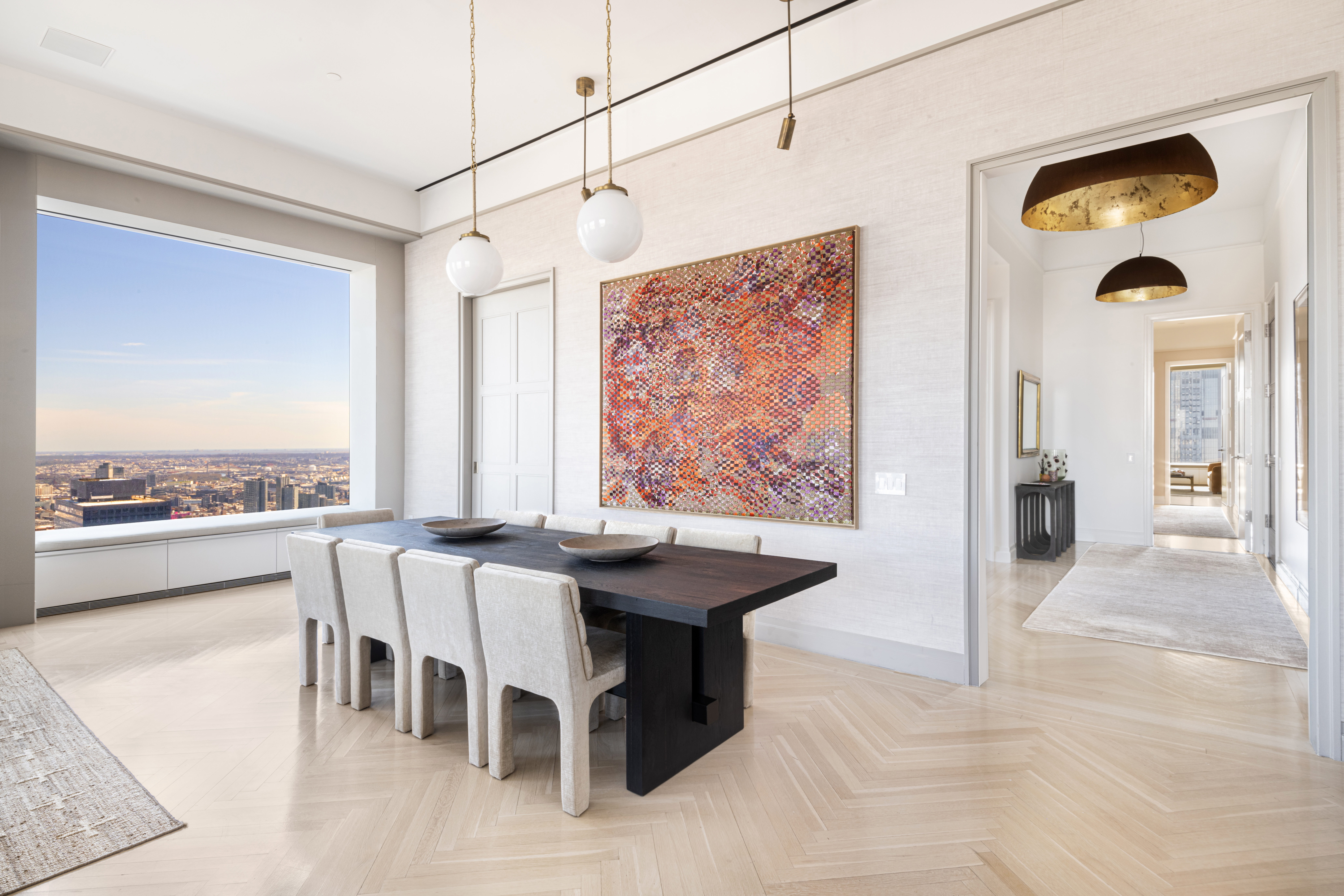 432 Park Avenue, Unit 55A Manhattan, NY 10022 - Photo 2 of 13 a dining room with furniture and a floor to ceiling window