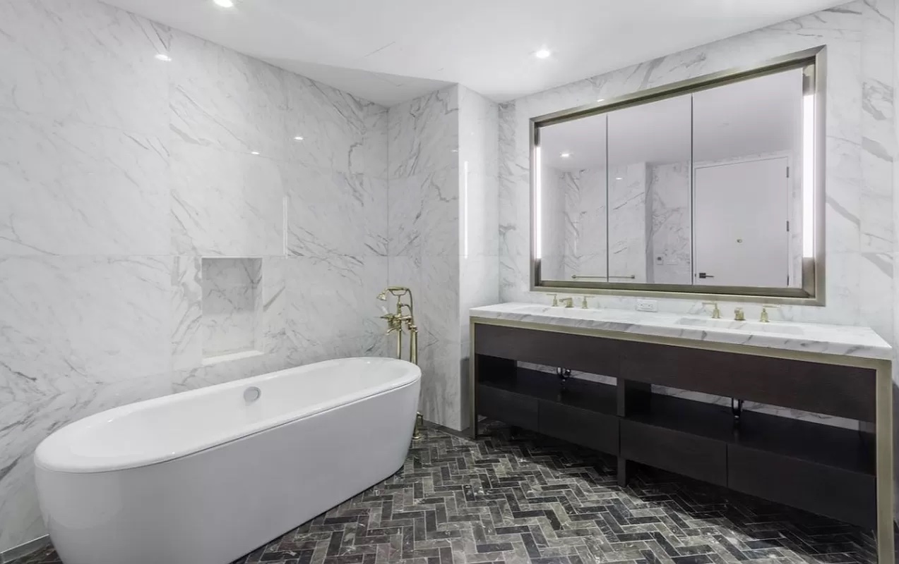 500 West 21st Street, Unit 3A Manhattan, NY 10011 - Photo 7 of 11 a bathroom with a bathtub and a sink