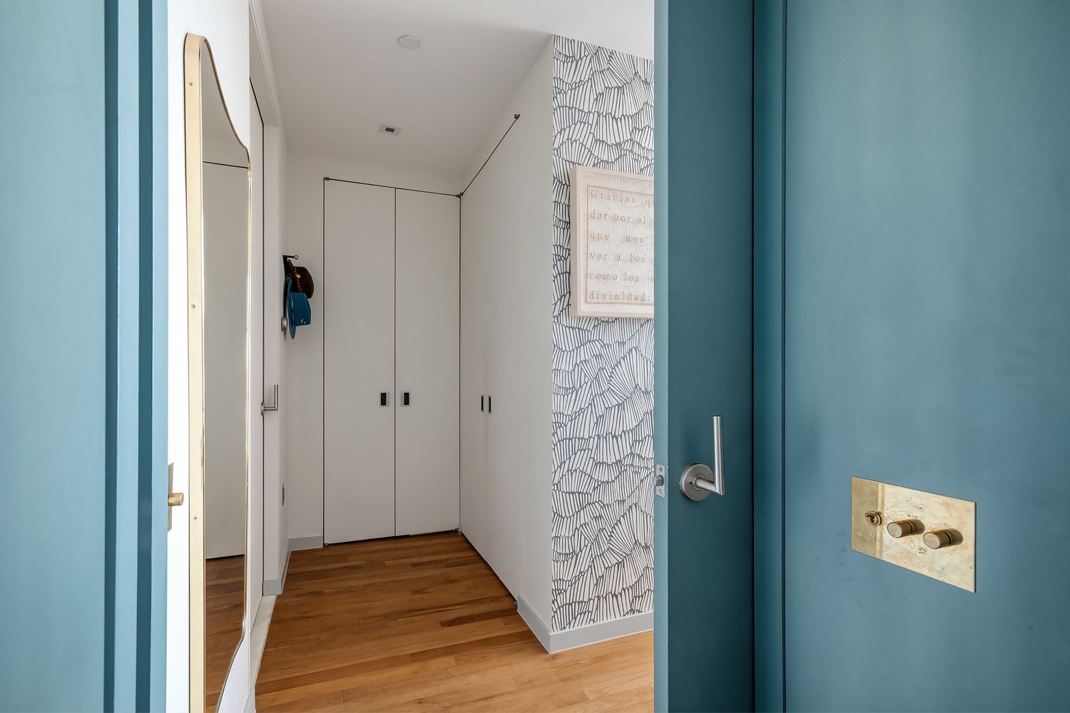 280 Metropolitan Avenue, Unit 5D Brooklyn, NY 11211 - Photo 6 of 22 a view of a hallway with wooden floor and closet area