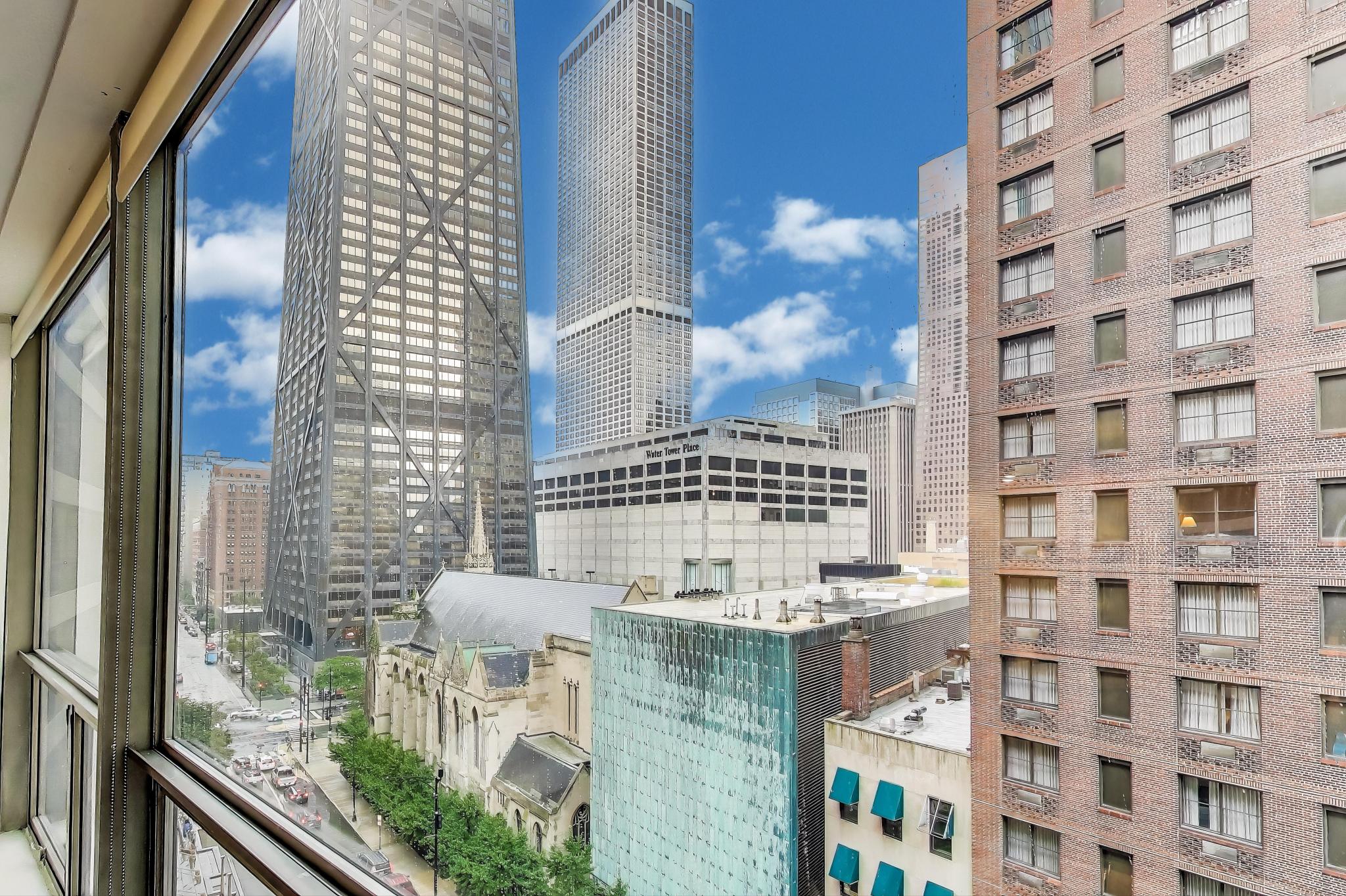 110 East Delaware Place, Unit 1402 Chicago, IL 60611 - Photo 3 of 23 a view of a building from balcony