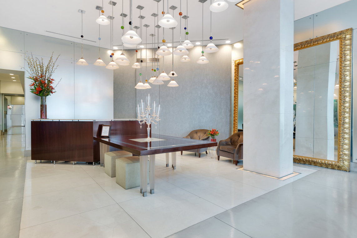 207 East 57th Street, Unit 34A Manhattan, NY 10022 - Photo 18 of 22 a view of a livingroom with furniture and a chandelier