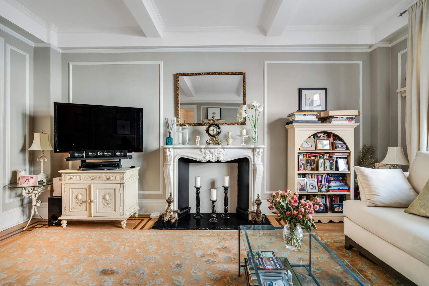 138 East 36th Street, Unit 3B Manhattan, NY 10016 - Photo 3 of 15 a living room with furniture and a flat screen tv