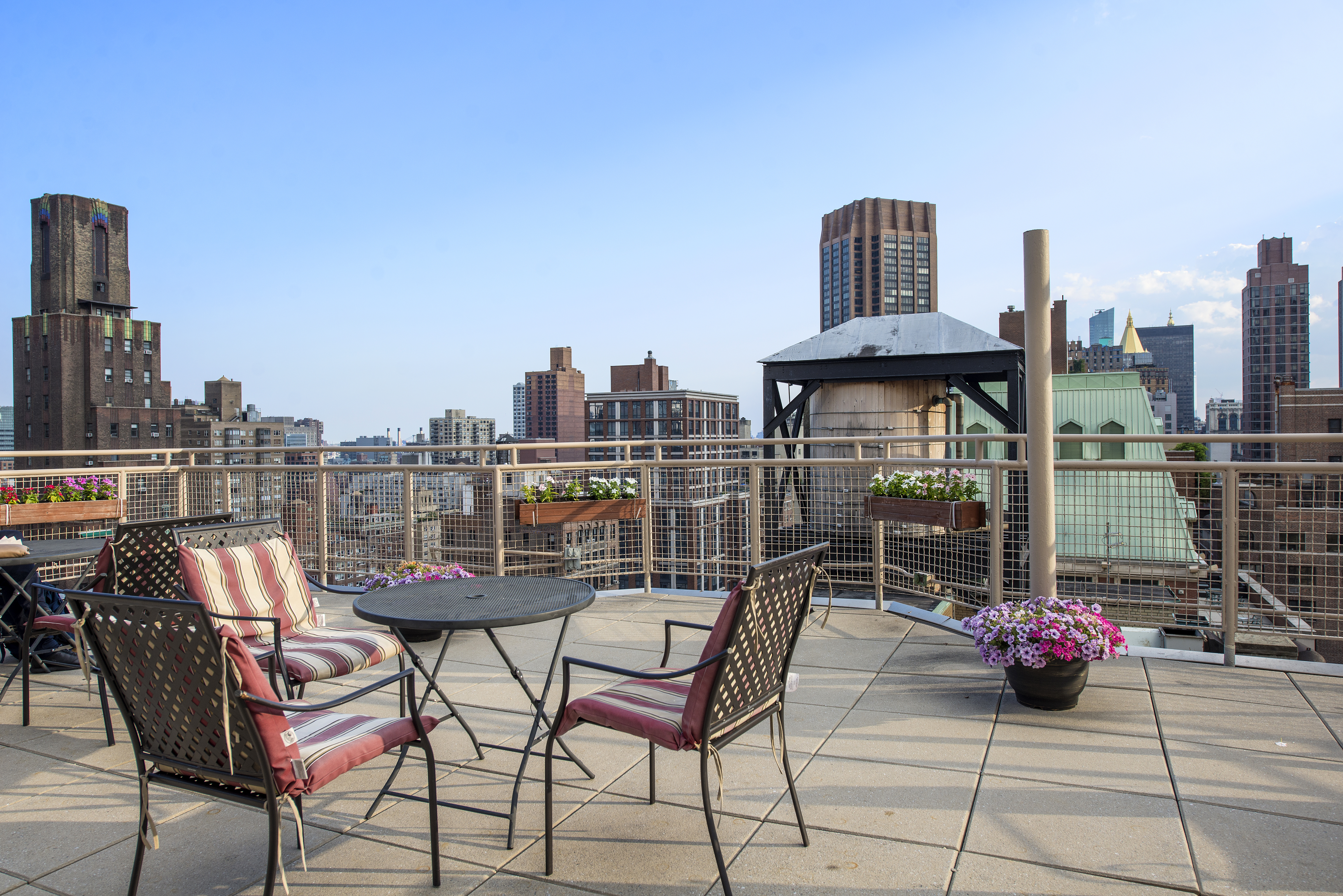 80 Park Avenue, Unit 9L Manhattan, NY 10016 - Photo 8 of 10 a view of a terrace with seating area