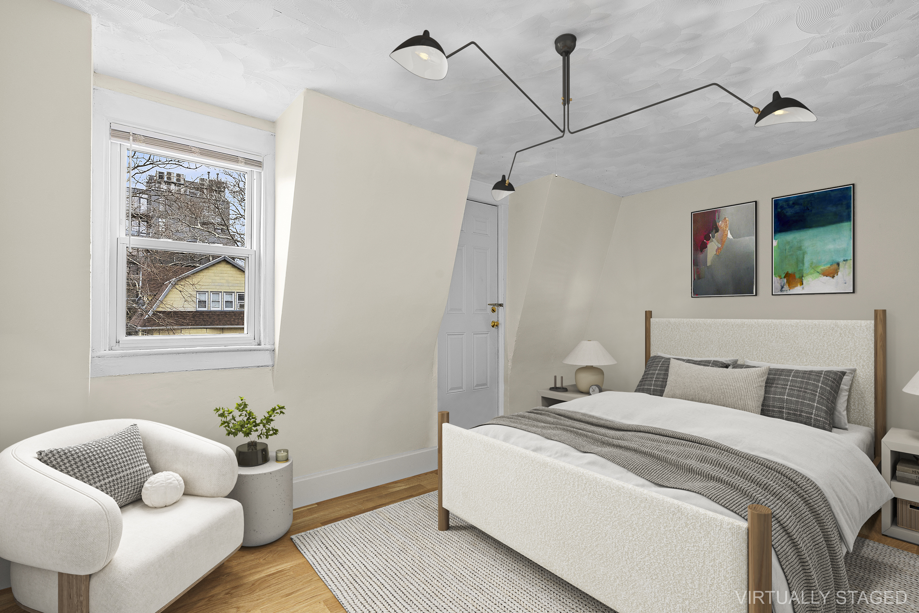 825 East 21st Street Brooklyn, NY 11210 - Photo 5 of 22 a bedroom with a bed couch and window