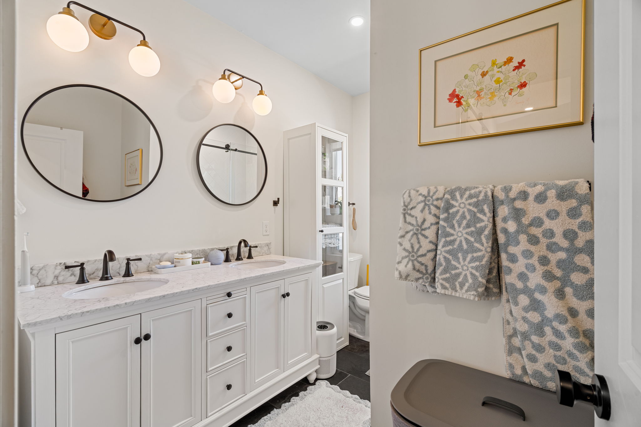 1934 Pemberton Street Philadelphia, PA 19146 - Photo 37 of 50 a bathroom with a toilet a sink and a mirror