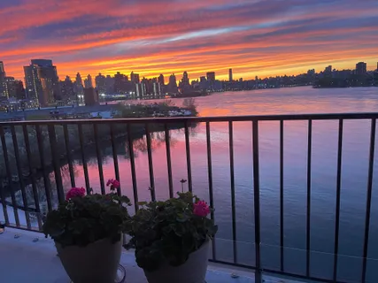 a front view of a building with street view