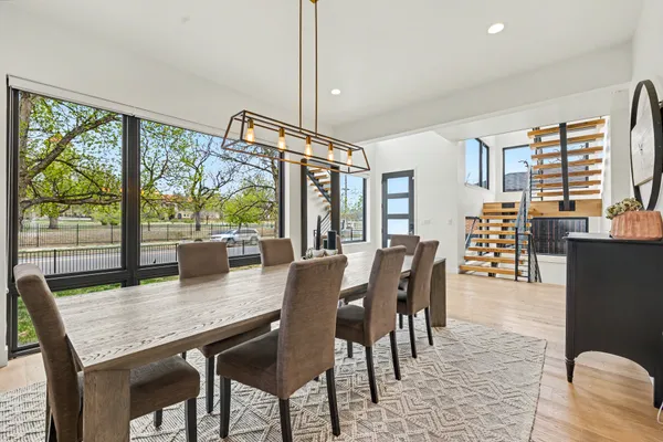 a view of a dining room with furniture window and outside view