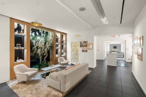 a view of balcony with outdoor space and garden