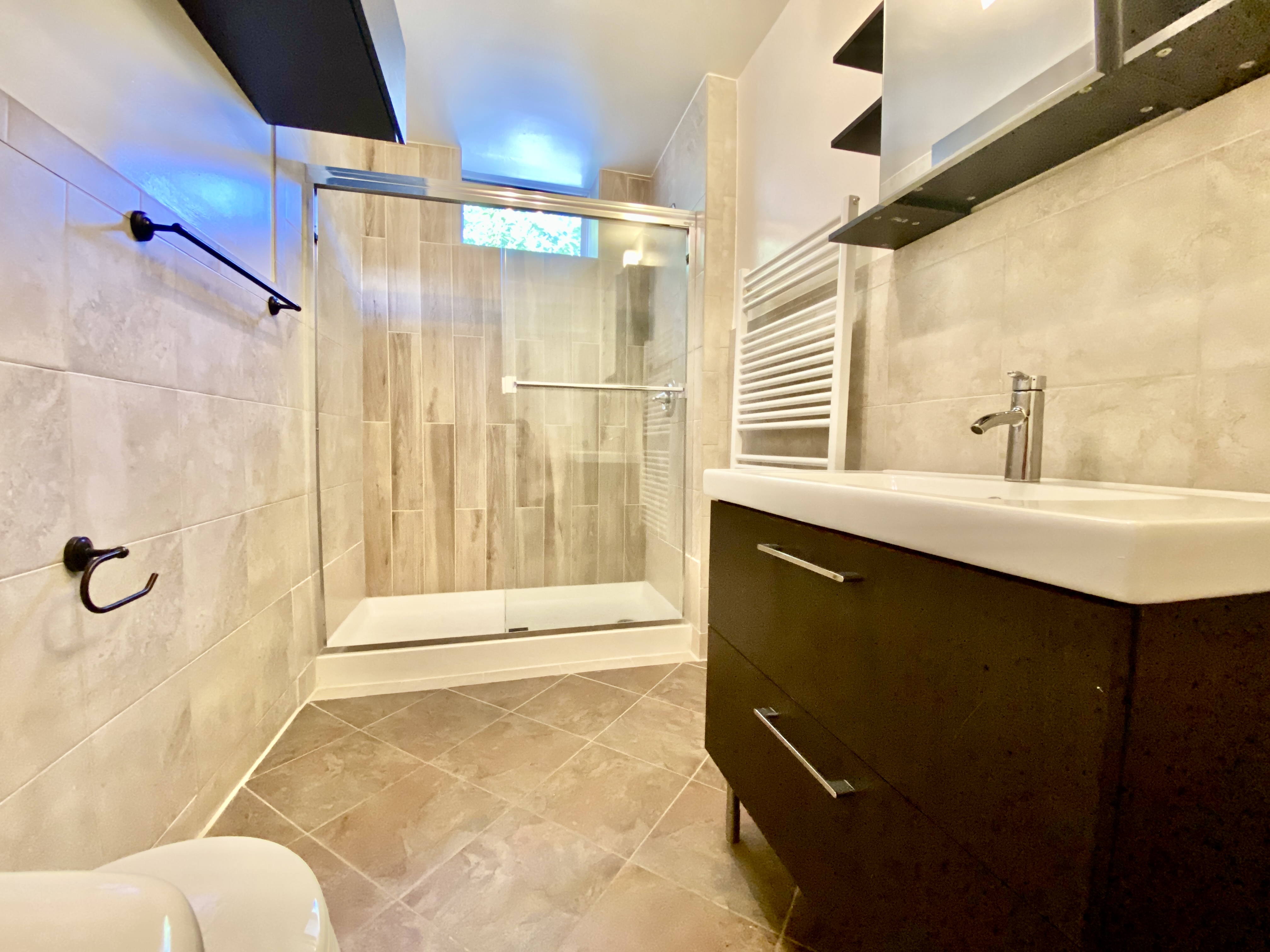 447 Degraw Street, Unit 1 Brooklyn, NY 11217 - Photo 9 of 11 a bathroom with a sink and a mirror