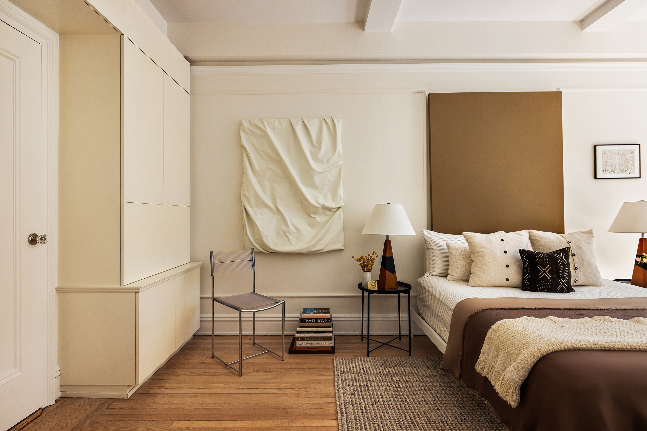 30 5th Avenue, Unit 6H Manhattan, NY 10011 - Photo 12 of 17 a living room with a bed furniture and a window