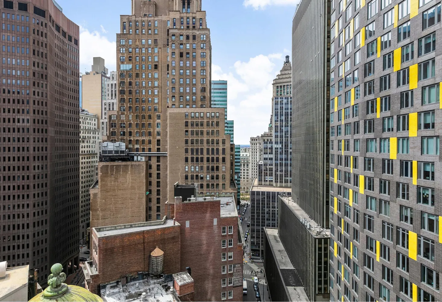 a view of a city with tall buildings