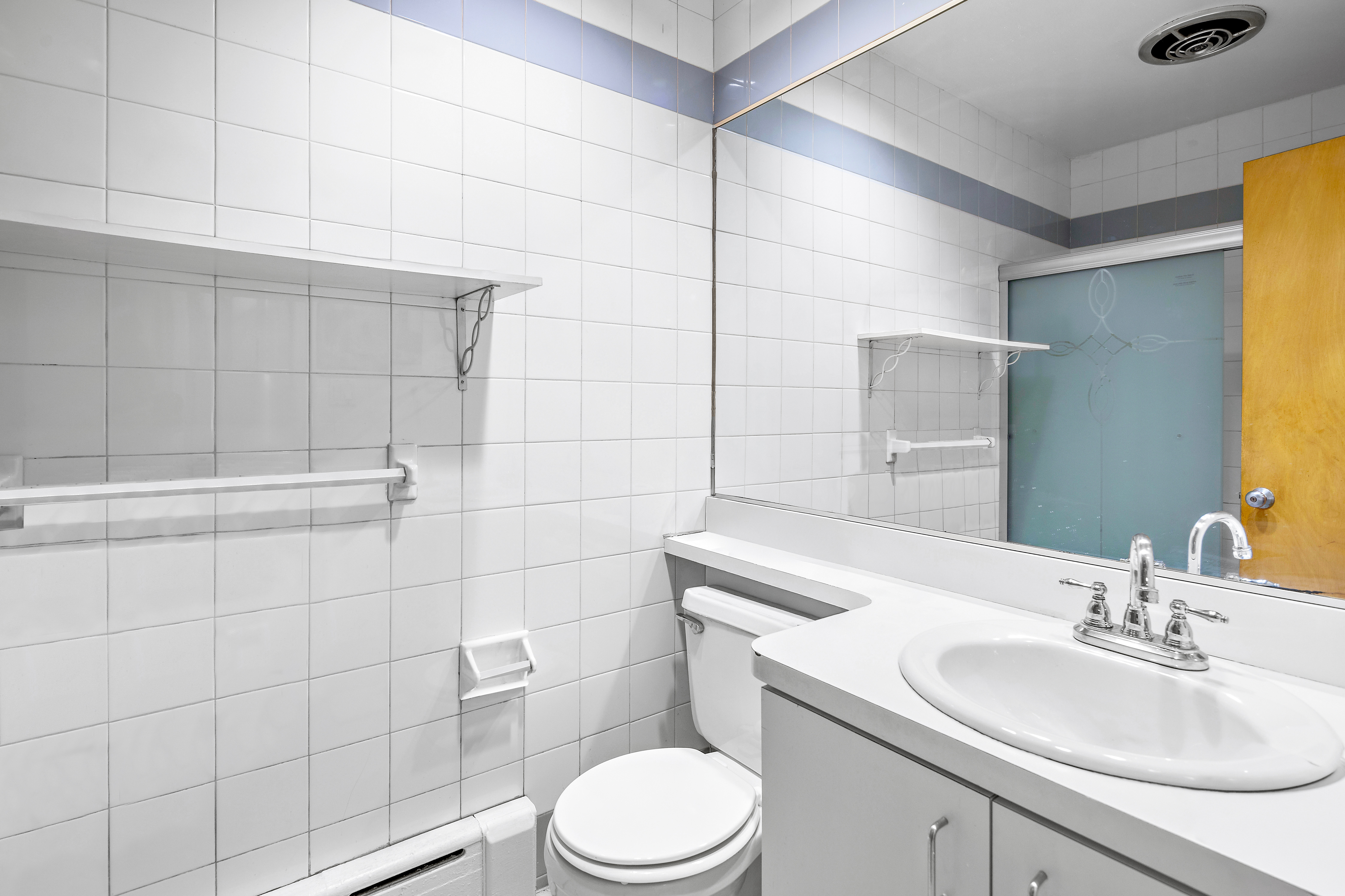 558 84th Street Brooklyn, NY 11209 - Photo 13 of 25 a bathroom with a sink toilet and shower