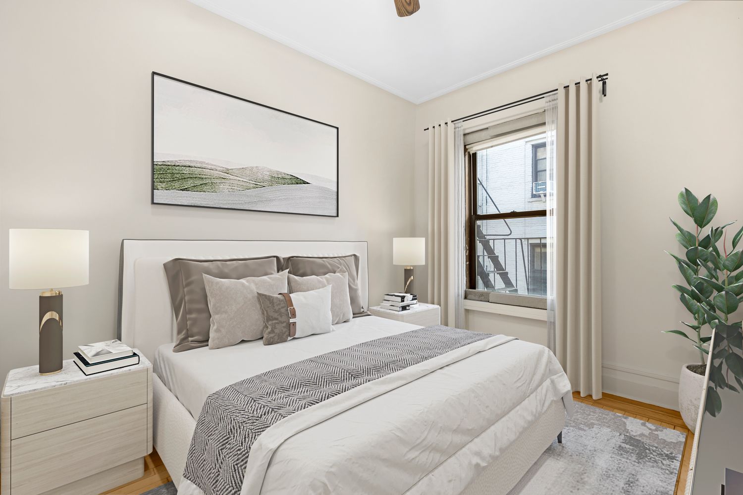 a bedroom with a bed and a painting on the wall