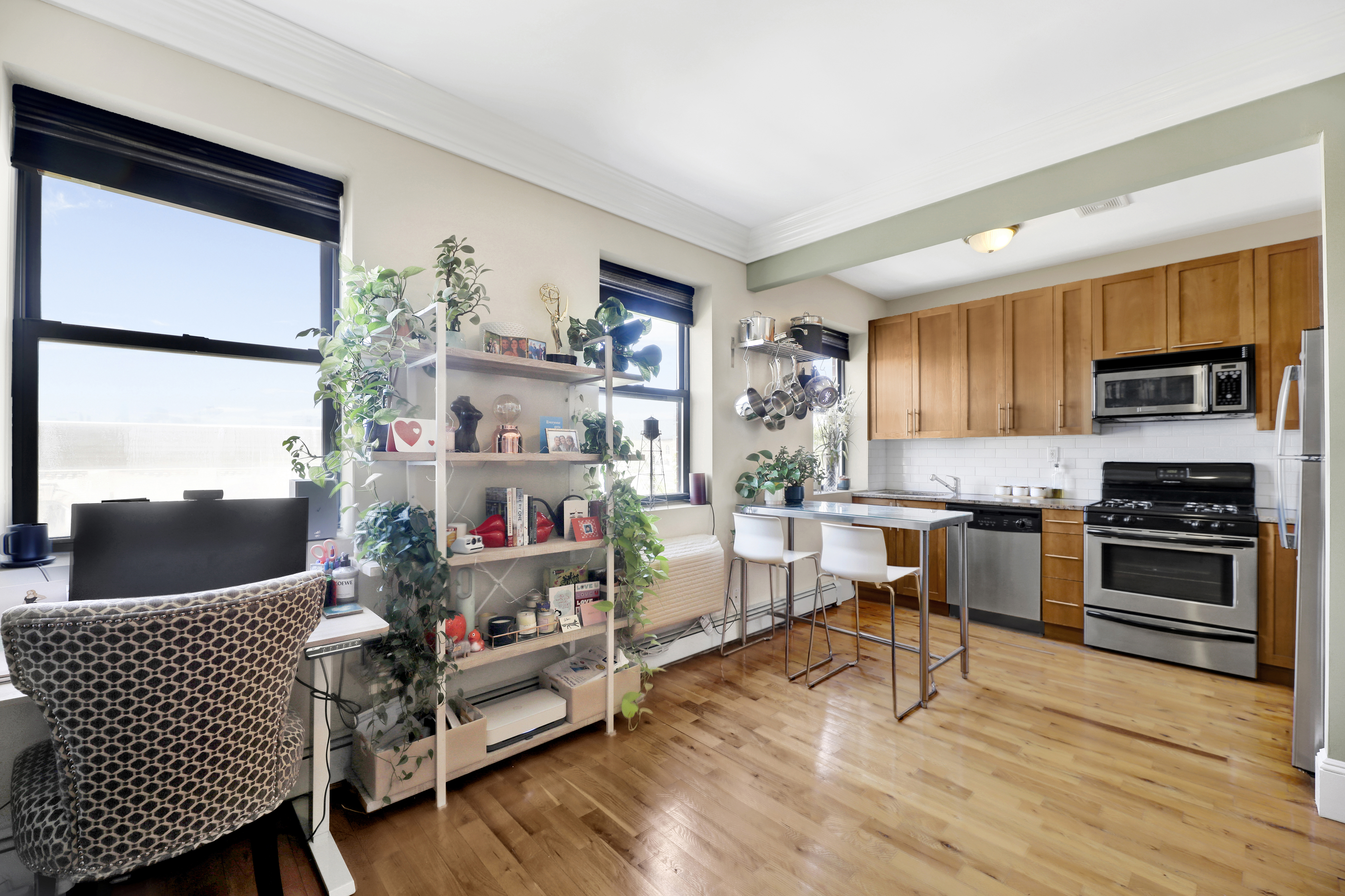 36 Russell Street, Unit 22 Brooklyn, NY 11222 - Photo 10 of 27 a living room with furniture and a kitchen view