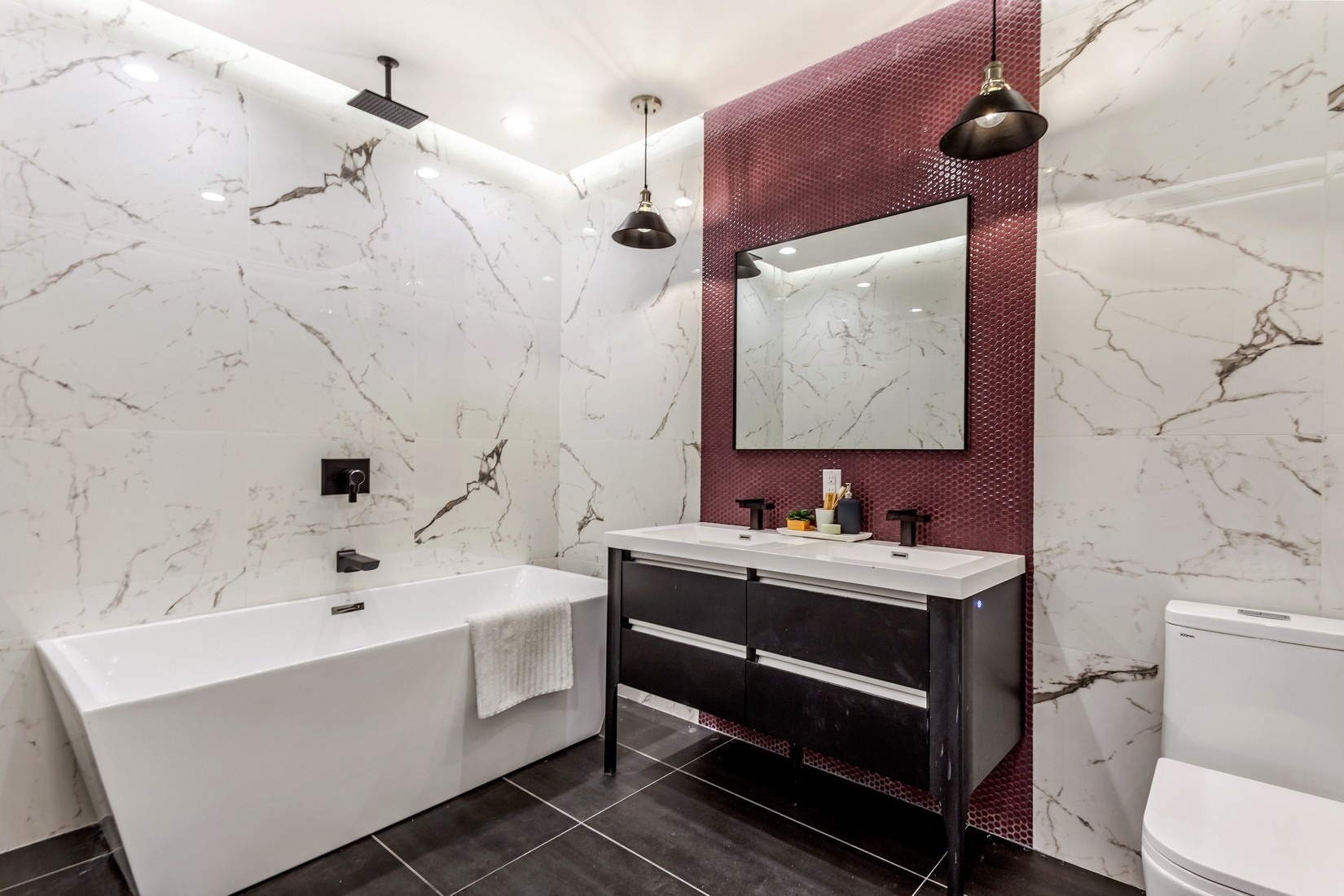 790 St Johns Place, Unit 4A Brooklyn, NY 11216 - Photo 4 of 8 a bathroom with a sink mirror vanity and toilet