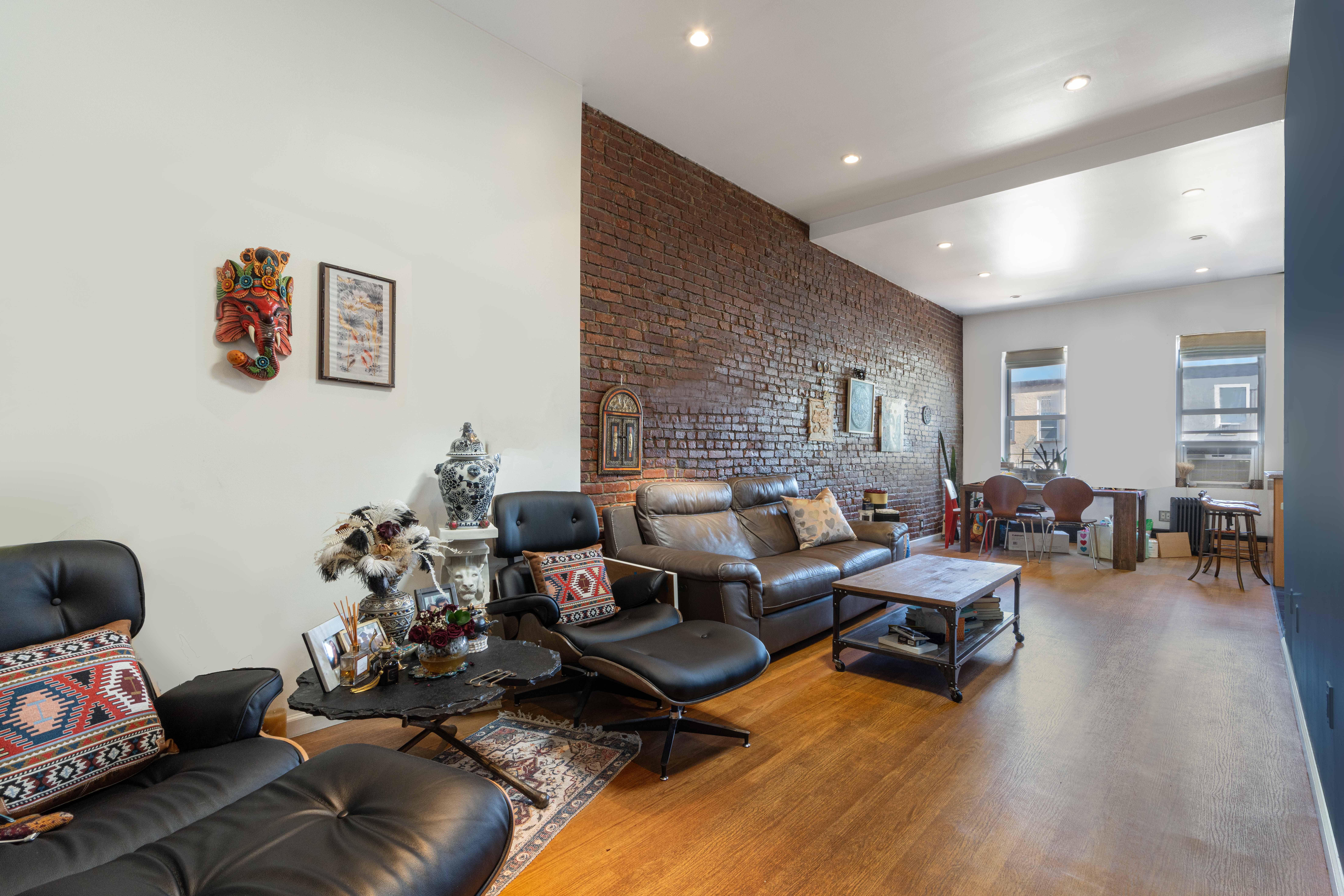 75-27 61st Street Queens, NY 11385 - Photo 4 of 10 a living room with furniture