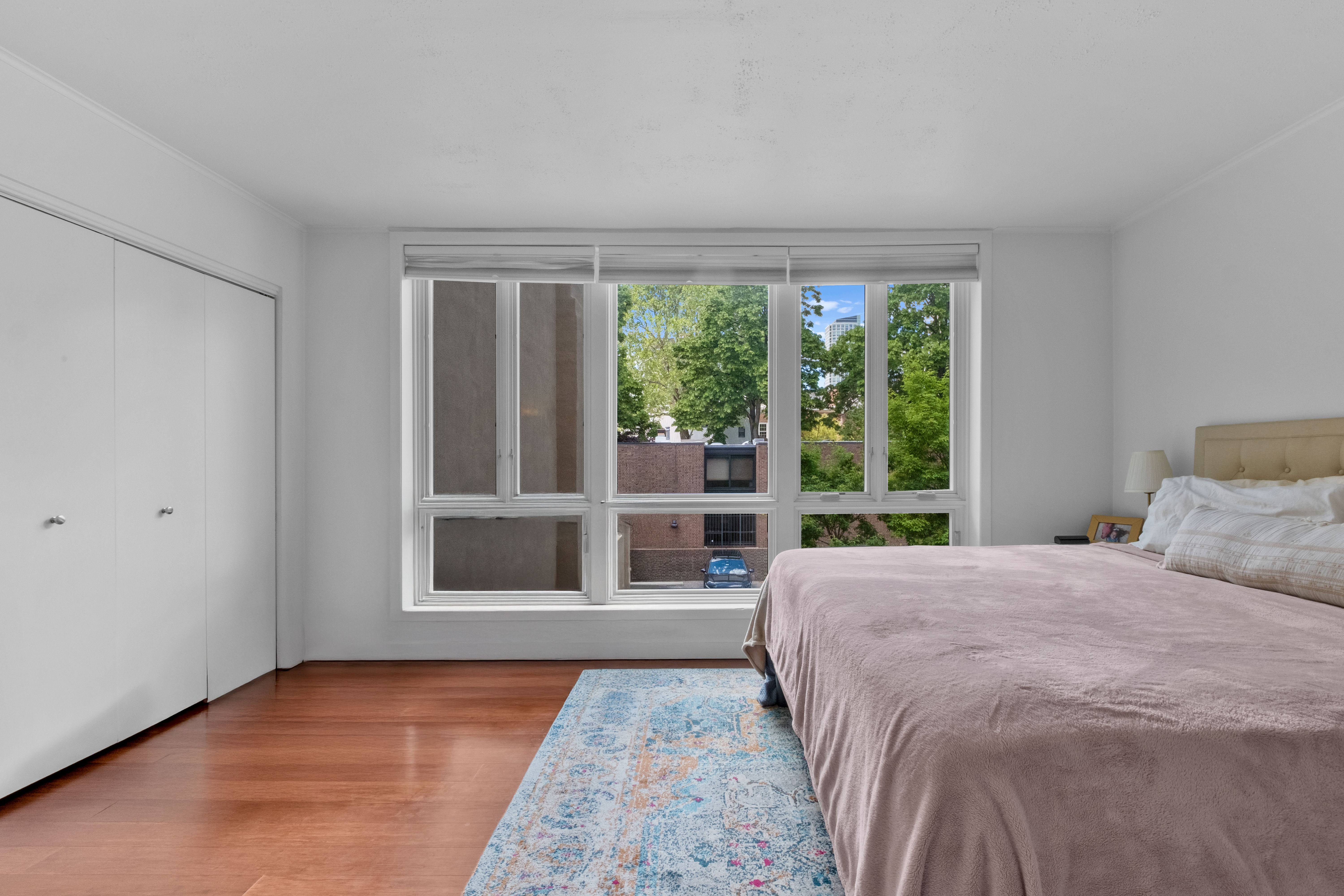 256 1/2 South 3rd Street Philadelphia, PA 19106 - Photo 65 of 73 a bedroom with a bed and a large window