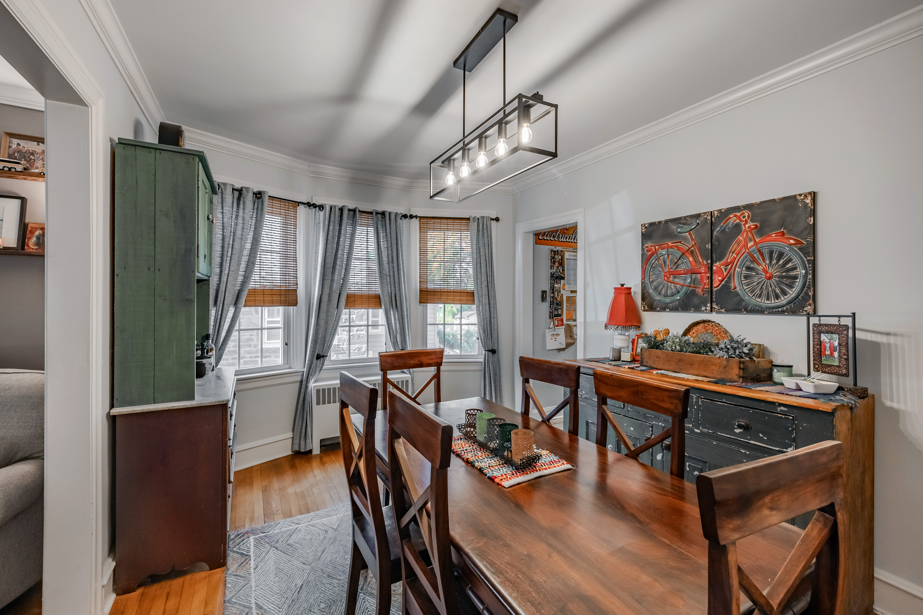 134 Strathmore Road Havertown, PA 19083 - Photo 14 of 64 a living room with furniture a flat screen tv and a large window
