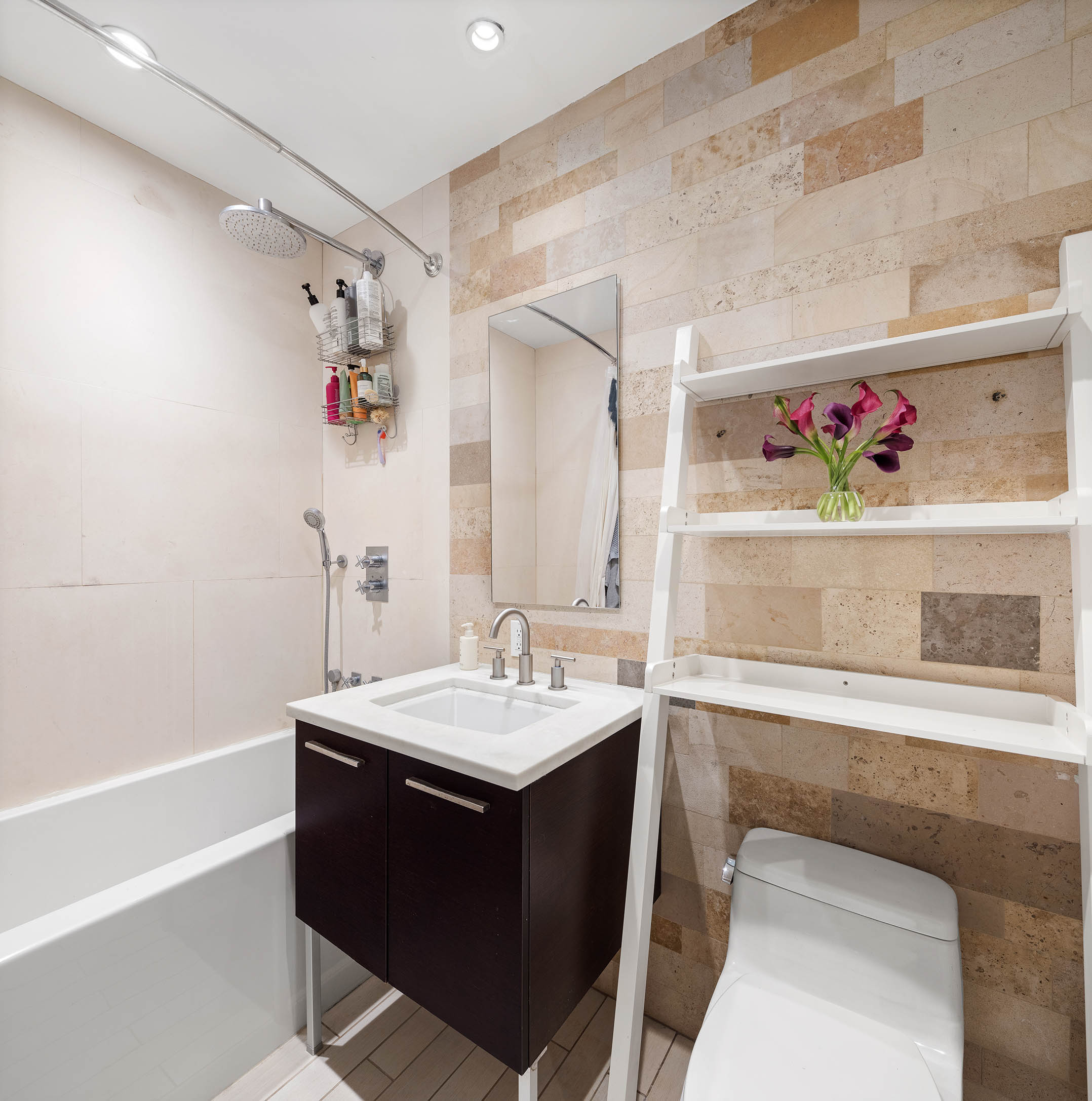 130 West 20th Street, Unit 1B Manhattan, NY 10011 - Photo 6 of 8 a bathroom with a sink and a mirror