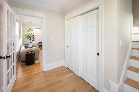 a living room with furniture and a gate