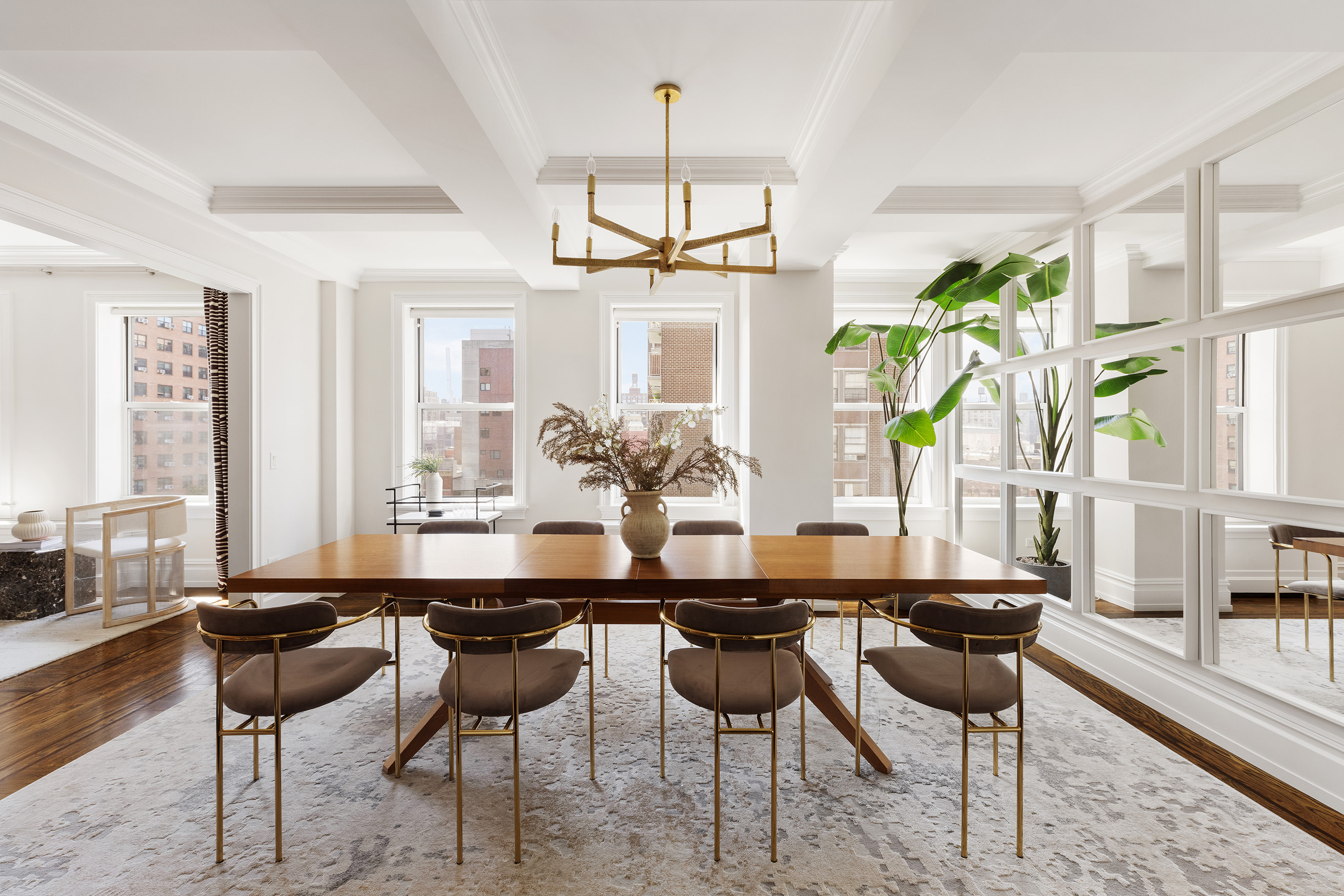 165 West 91st Street, Unit 9AB Manhattan, NY 10024 - Photo 4 of 24 a dining room with furniture and a large window