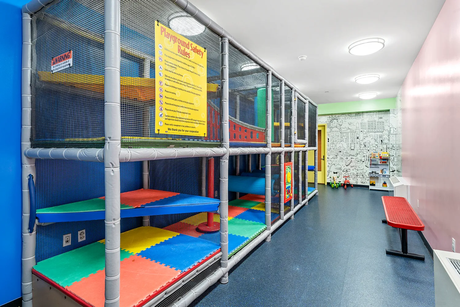 a view of a terrace with furniture and flowers