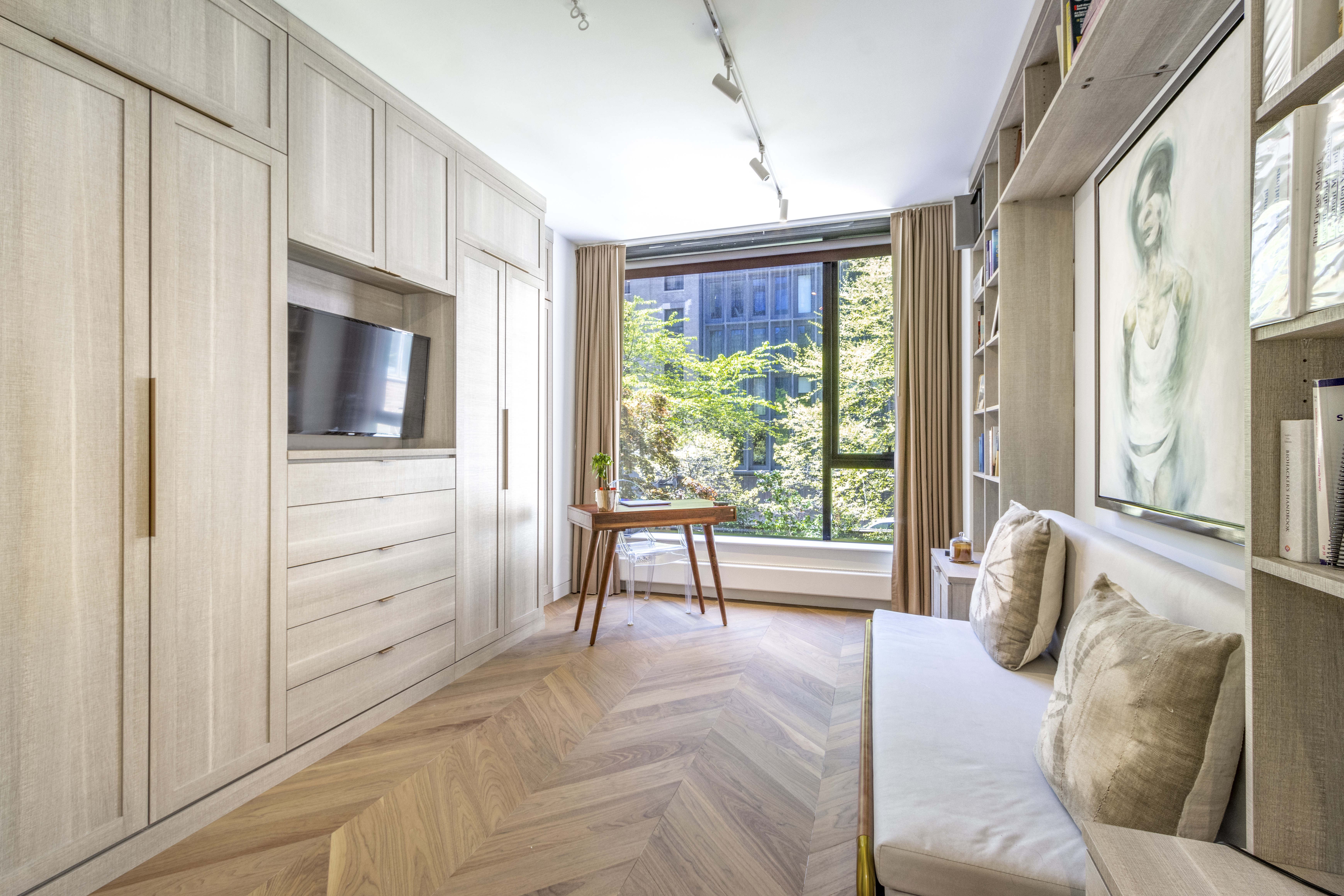 255 Hudson Street, Unit TH3 Manhattan, NY 10013 - Photo 5 of 11 a living room with furniture and a flat screen tv