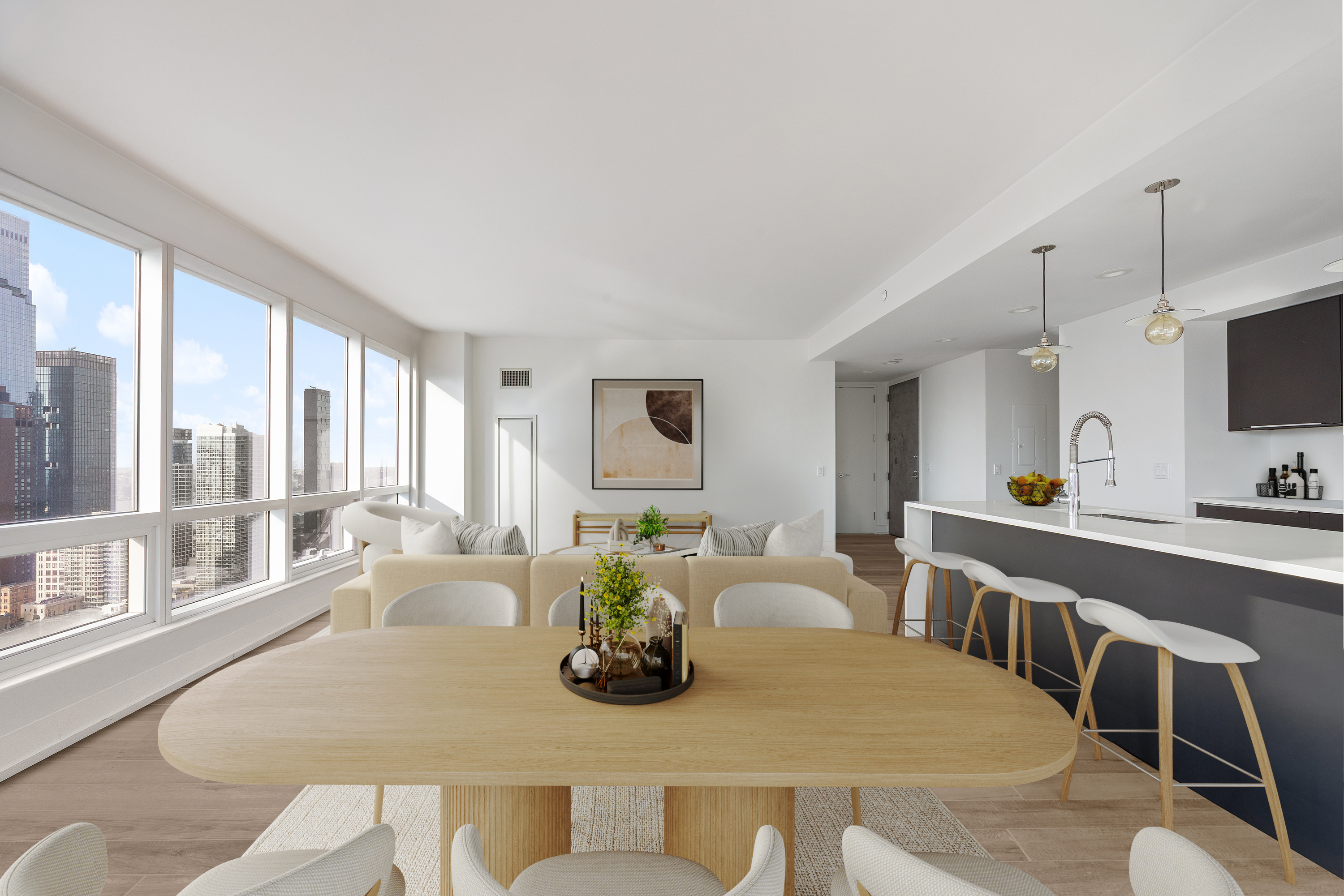 350 West 42nd Street, Unit 37G Manhattan, NY 10036 - Photo 4 of 14 a large kitchen with a table and chairs