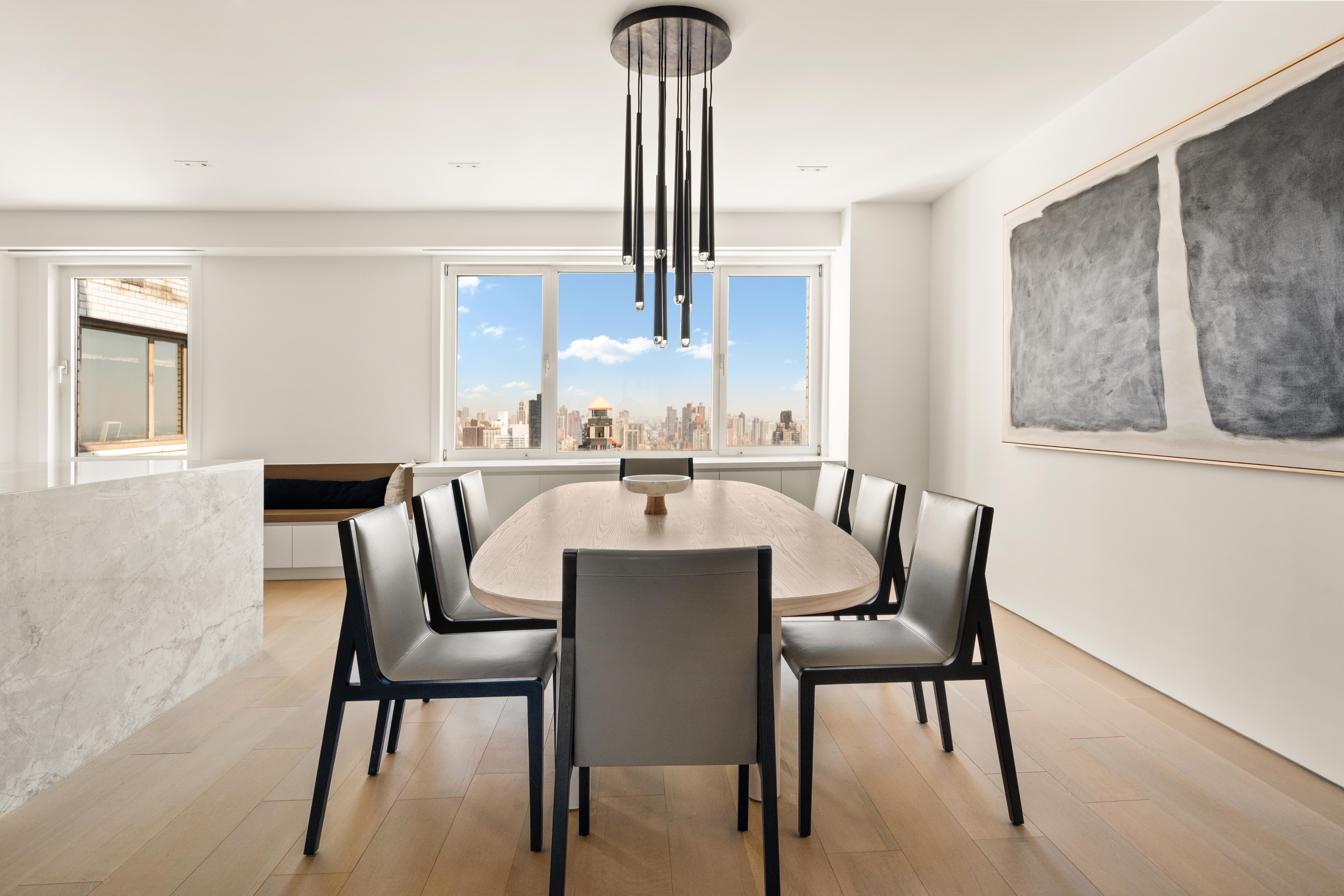 303 East 57th Street, Unit 44G Manhattan, NY 10022 - Photo 5 of 19 a view of a dining room with furniture