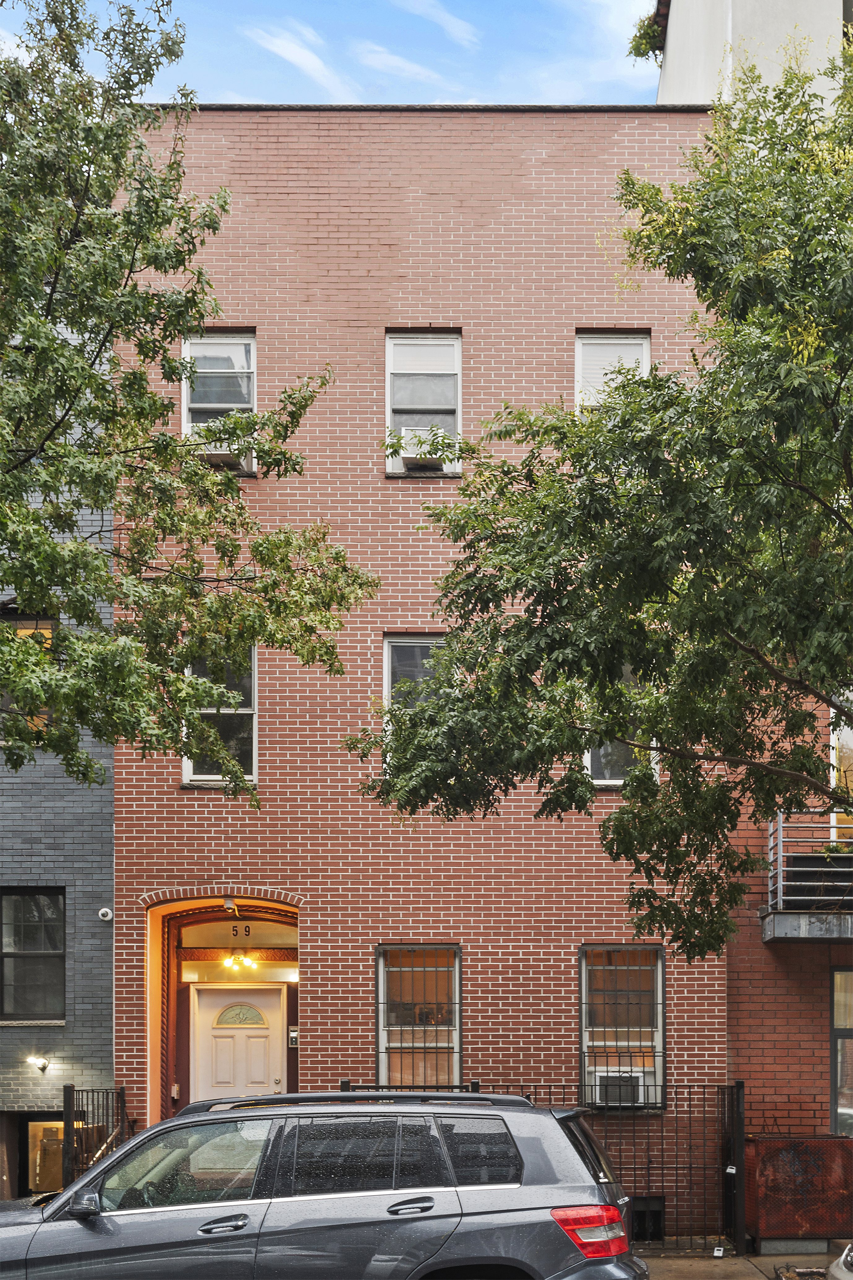 59 Stagg Street, Unit 3 Brooklyn, NY 11206 - Photo 7 of 8 a front view of a house with parking space