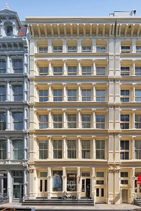 20 Greene Street, Unit 4B Manhattan, NY 10013 - Photo 12 of 13 a front view of a building with a lots of windows