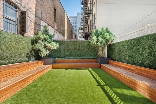 a view of building with yard