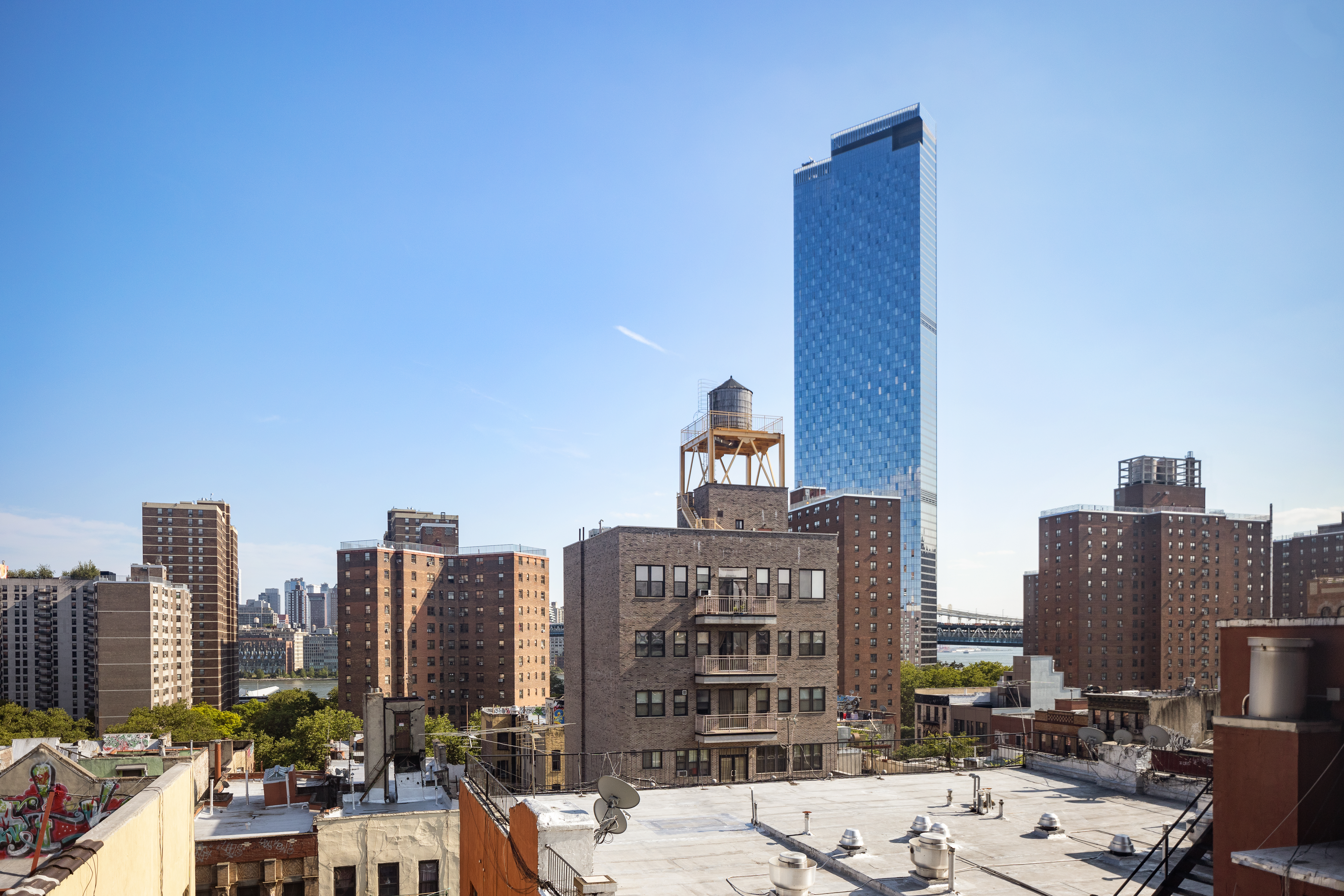 175 East Broadway, Unit 6D Manhattan, NY 10002 - Photo 17 of 18 a view of roof with tall buildings