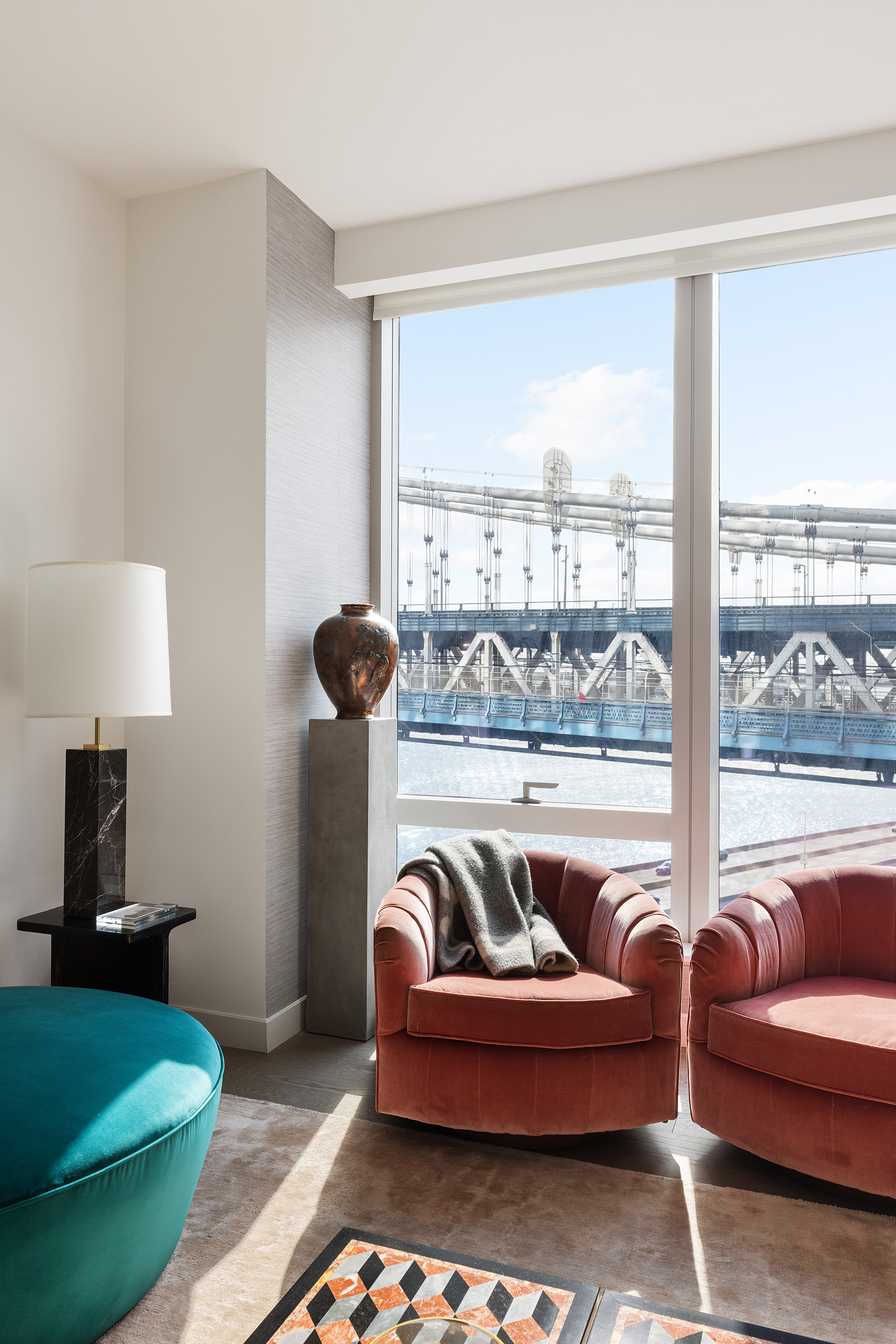 252 South Street, Unit 12N Manhattan, NY 10002 - Photo 2 of 9 a living room with furniture and a large window