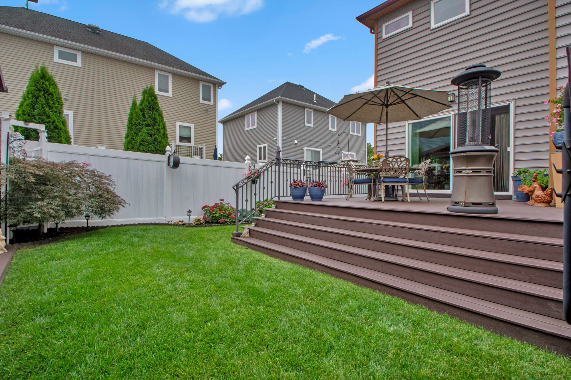 909 Jewett Avenue Staten Island, NY 10314 - Photo 54 of 65 a view of a house with a yard