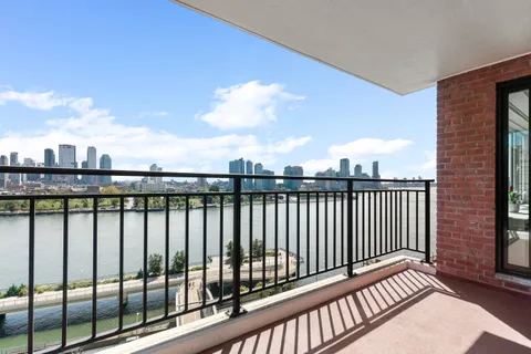 a view of city from a balcony