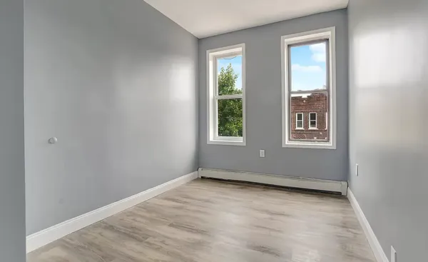 an empty room with windows