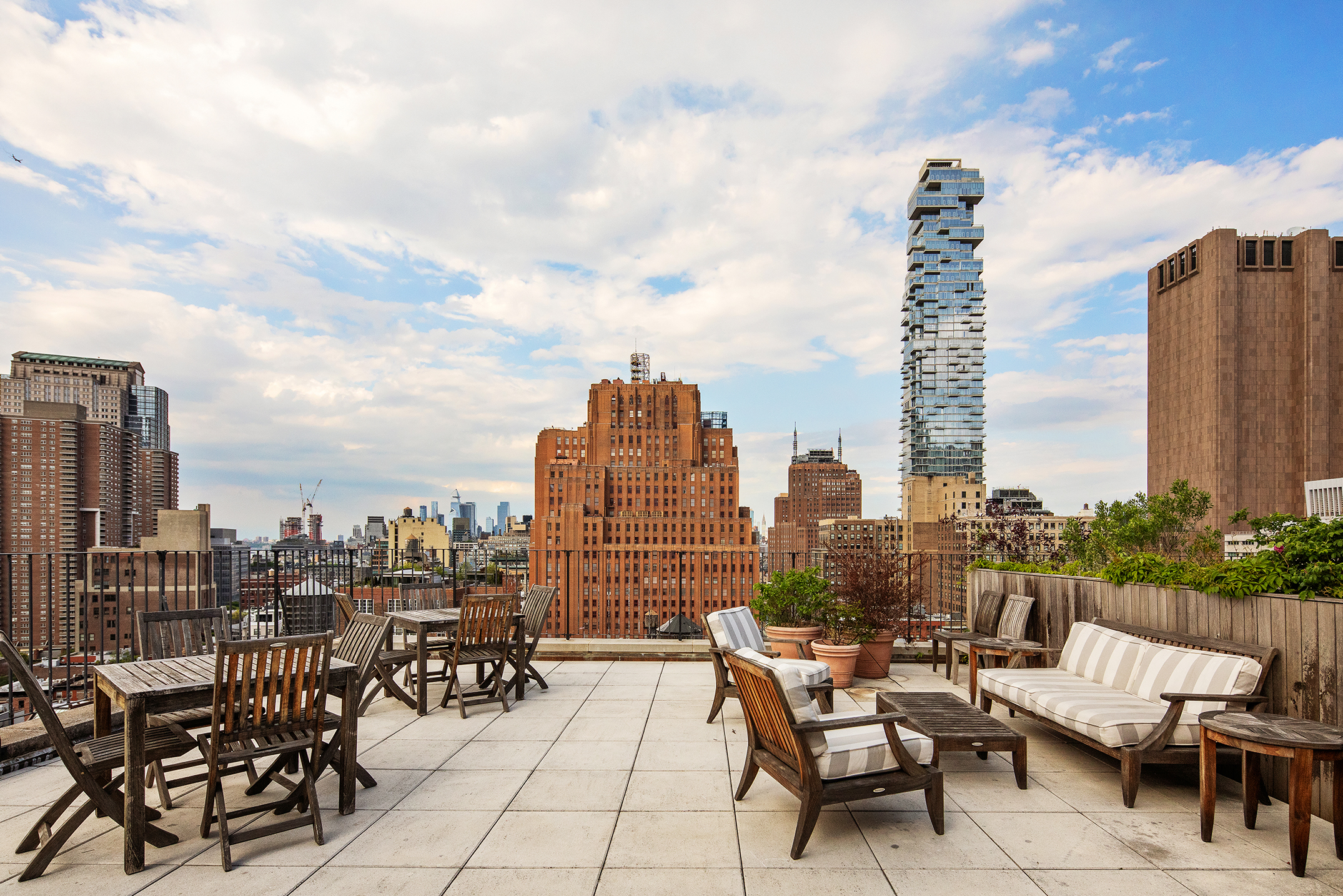 90 West Broadway, Unit 2B Manhattan, NY 10007 - Photo 10 of 12 a view of a city with furniture