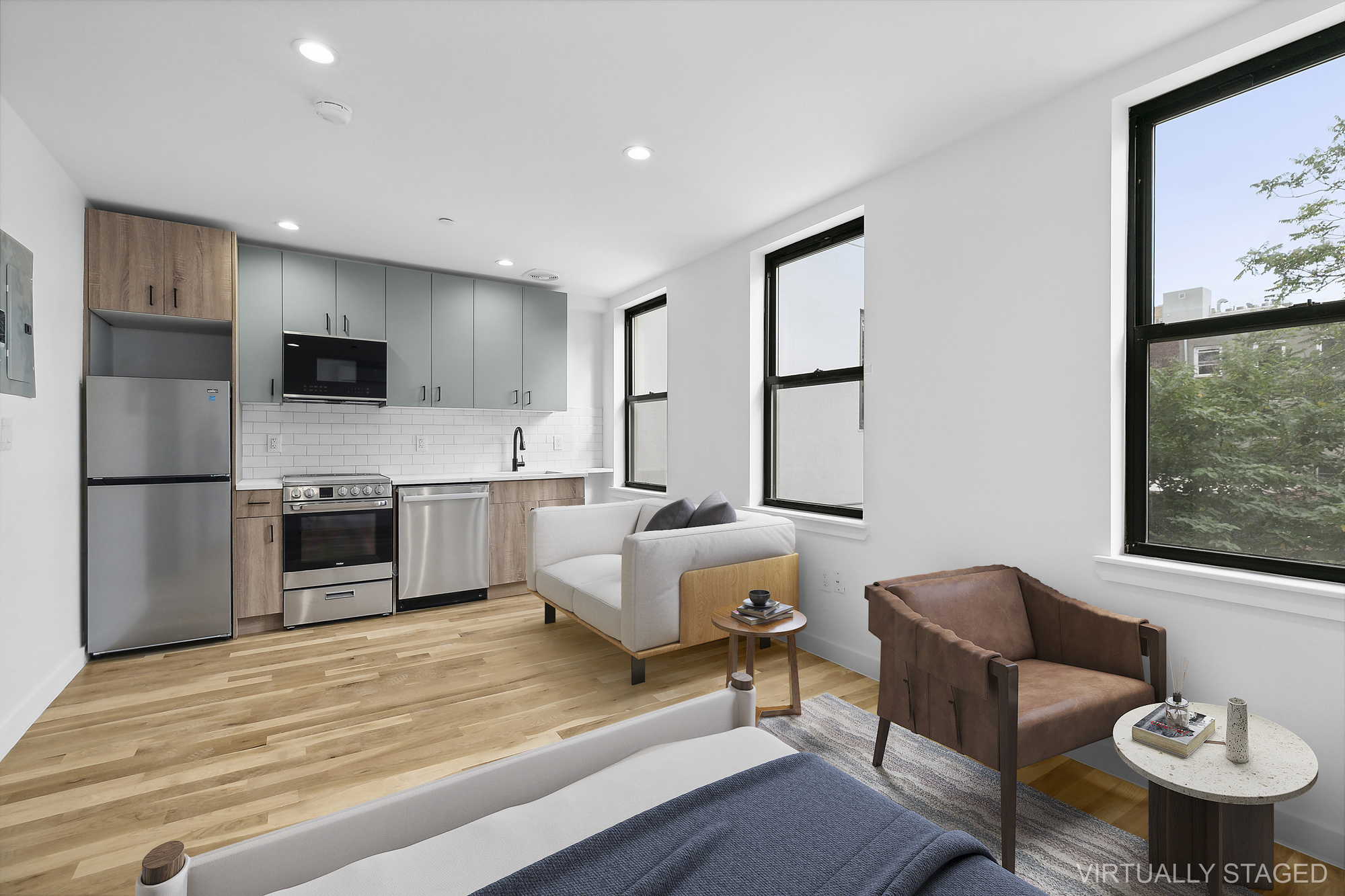 116 Madison Street Brooklyn, NY 11216 - Photo 11 of 20 a living room with furniture and a flat screen tv