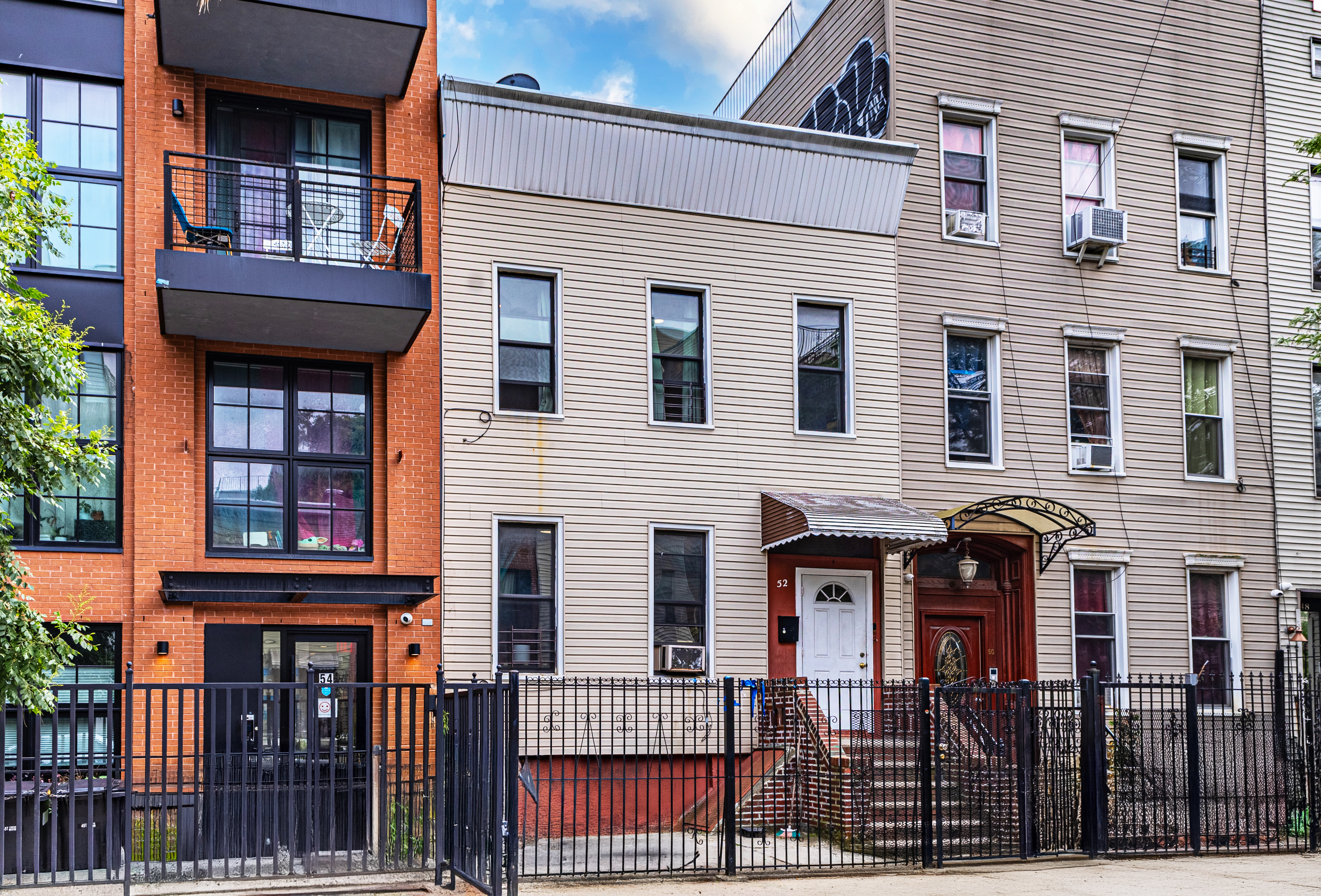 52 Himrod Street Brooklyn, NY 11221 - Photo 16 of 16 a front view of residential houses