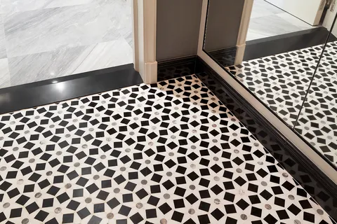 a view of staircase with white walls and railing